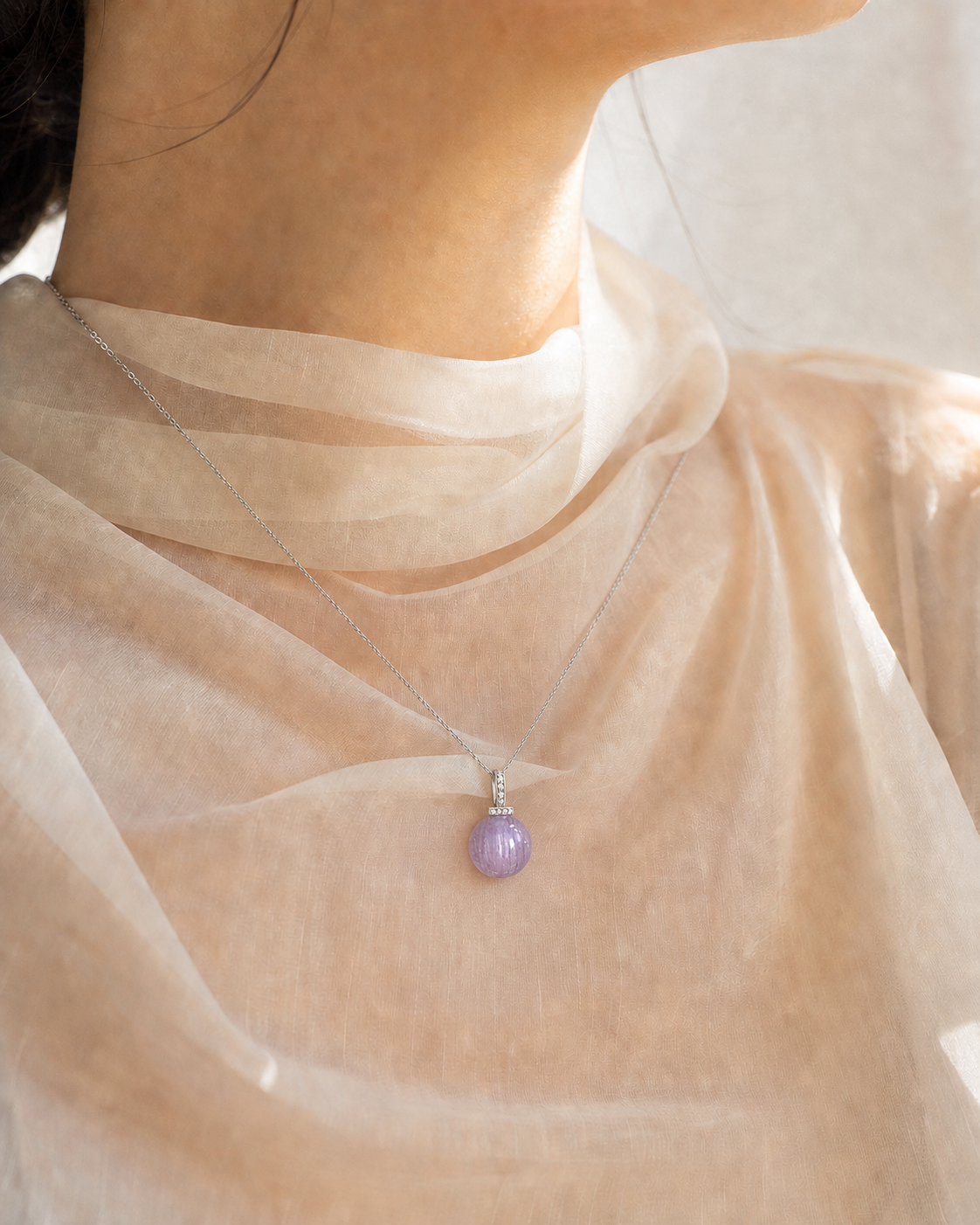 Kunzite interchangeable pendant necklace, worn styling view