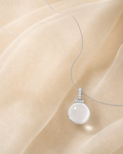Clear quartz interchangeable pendant necklace styled with sheer organza