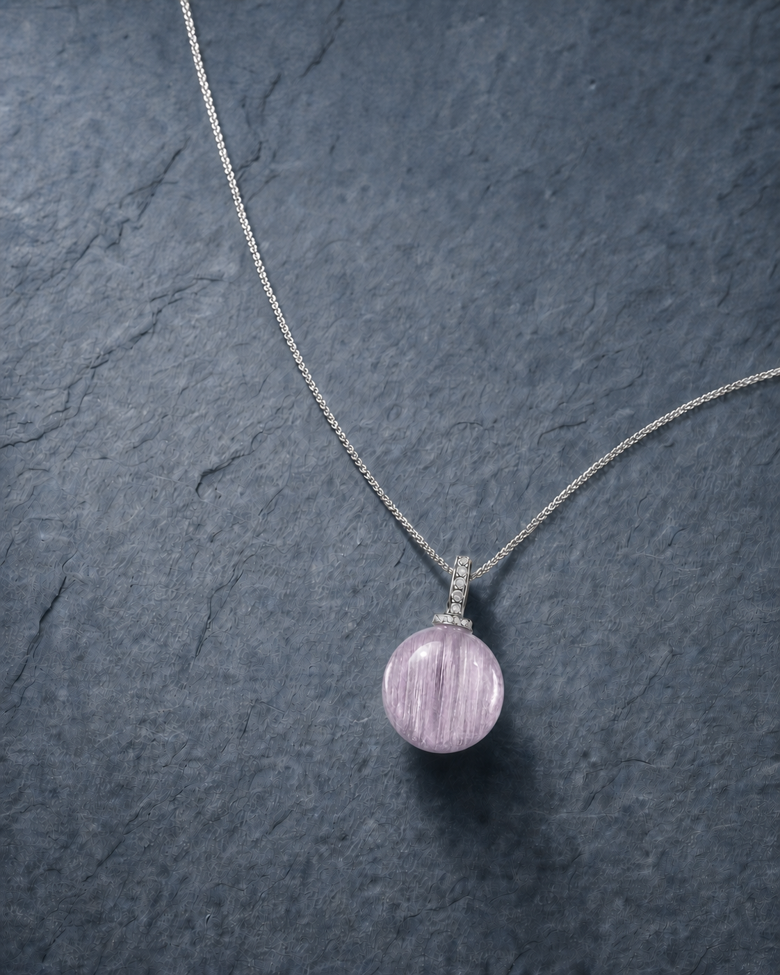 Kunzite interchangeable pendant necklace, crystal still-life detail