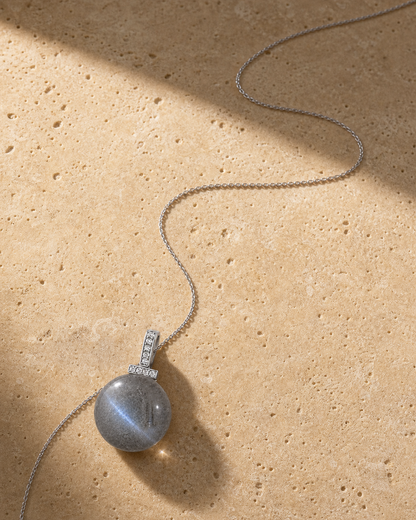 Gray Moonstone interchangeable pendant necklace, crystal still-life detail