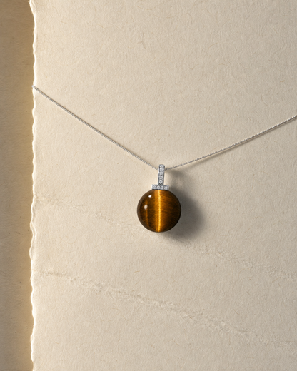 Yellow Tiger’s Eye interchangeable pendant necklace, crystal still-life detail