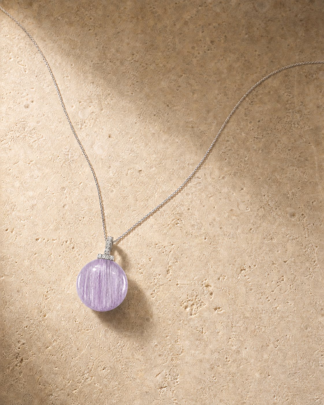 Kunzite interchangeable pendant necklace, crystal still-life detail