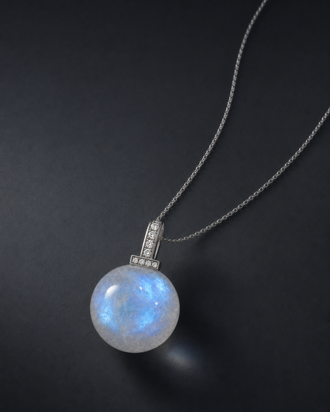 Blue Moonstone interchangeable pendant necklace, crystal still-life detail