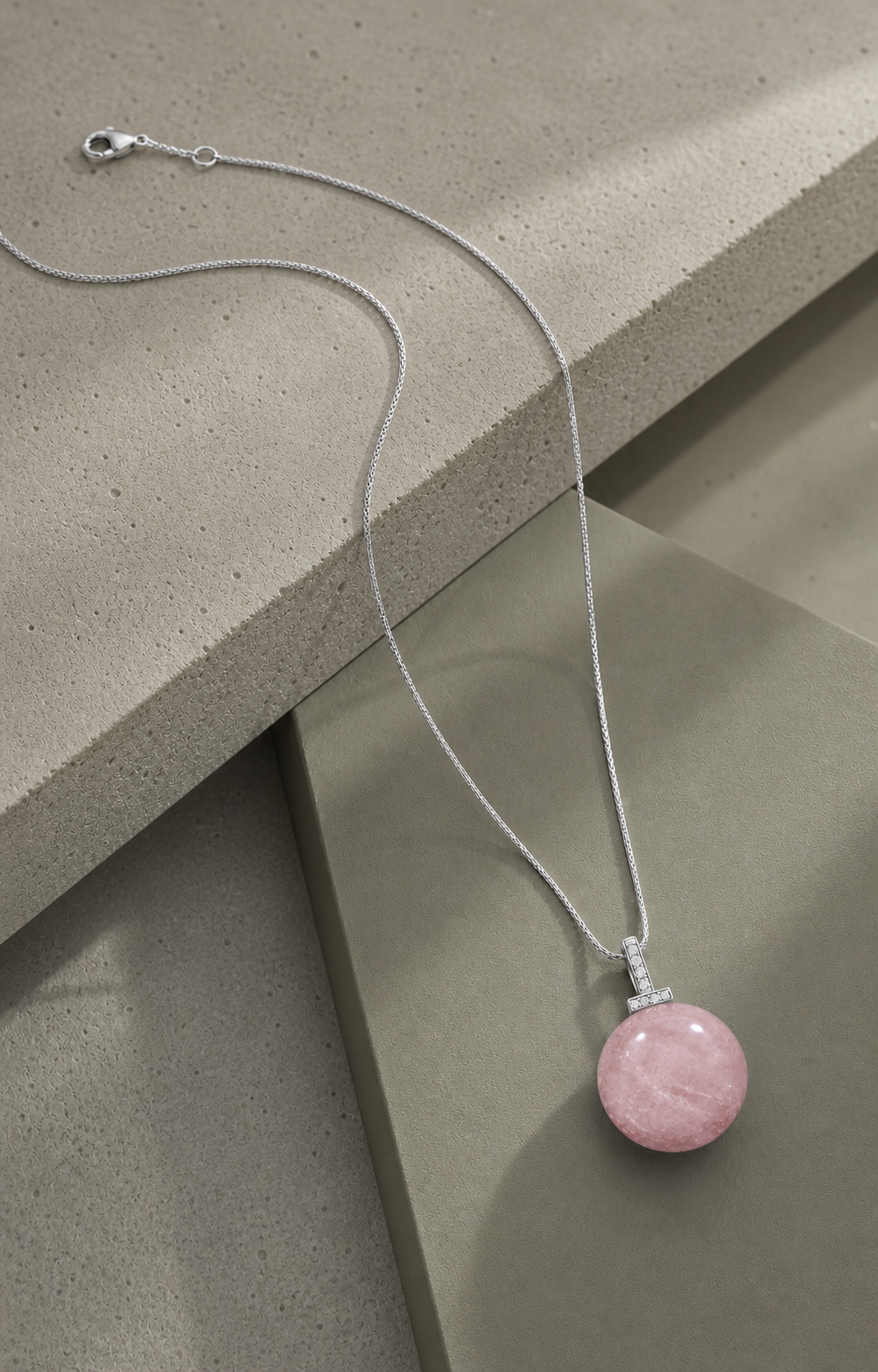 Rose Quartz interchangeable pendant necklace, crystal still-life detail