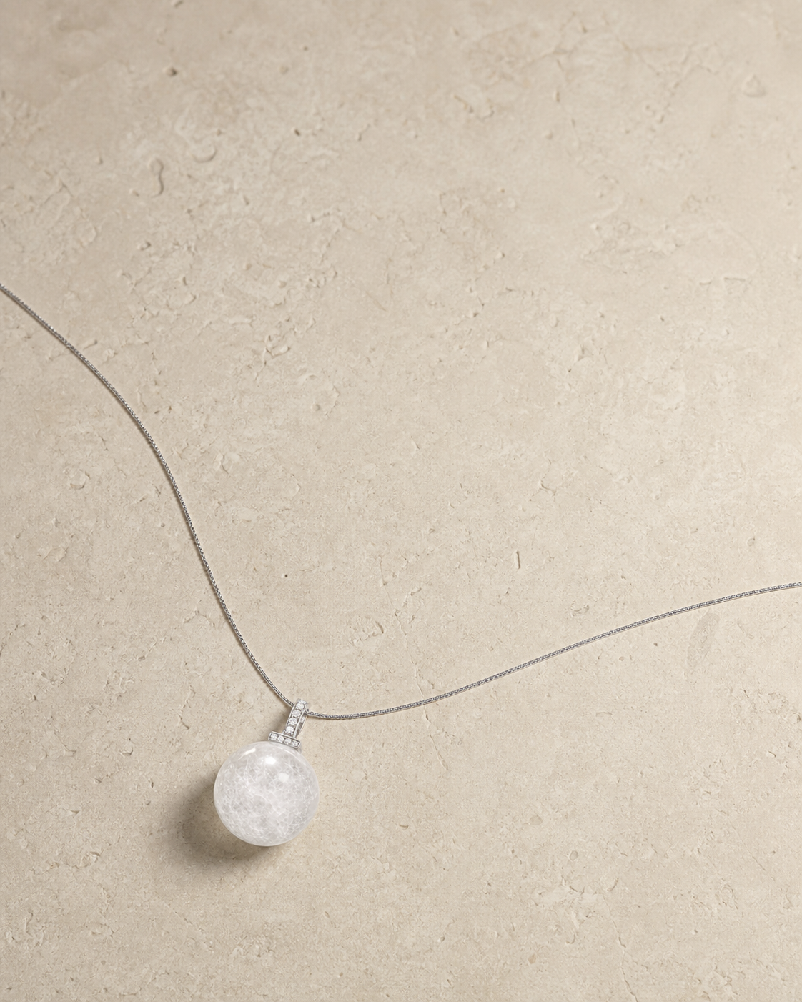 White Phantom Quartz interchangeable pendant necklace, crystal still-life detail