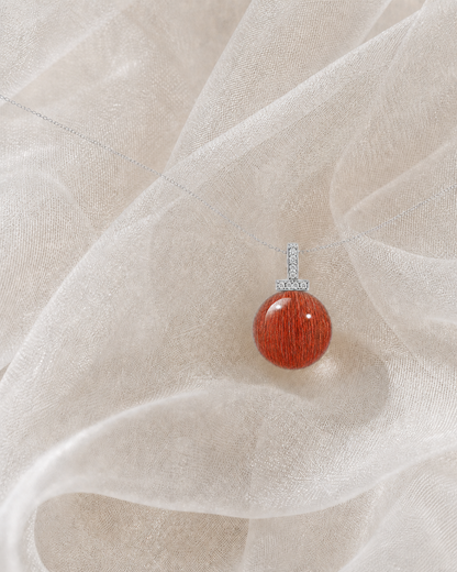 Red Rabbit Hair Quartz interchangeable pendant necklace, crystal still-life detail