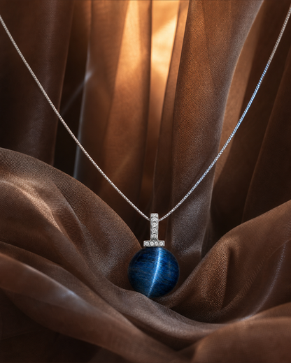 Blue Tiger’s Eye interchangeable pendant necklace, crystal still-life detail