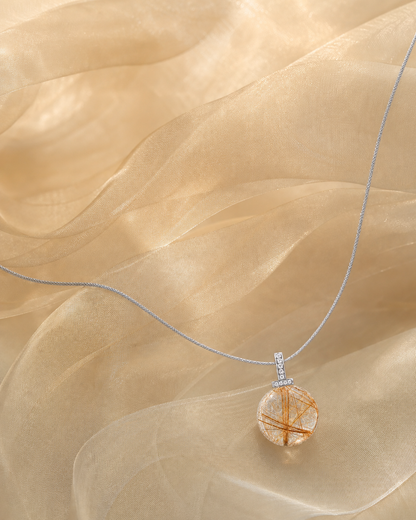 Golden Rutilated Quartz interchangeable pendant necklace, crystal still-life detail
