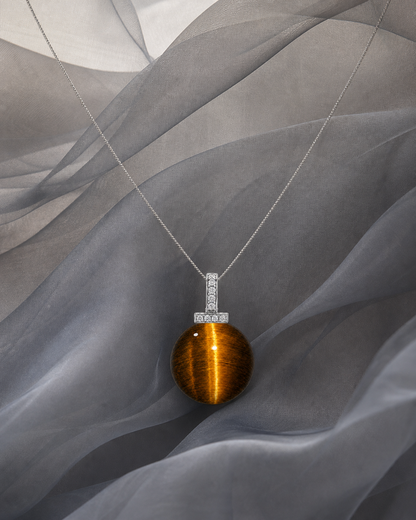 Yellow Tiger’s Eye interchangeable pendant necklace, crystal still-life detail