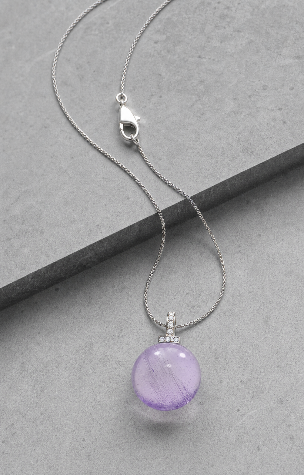 Bolivian Amethyst interchangeable pendant necklace, crystal still-life detail