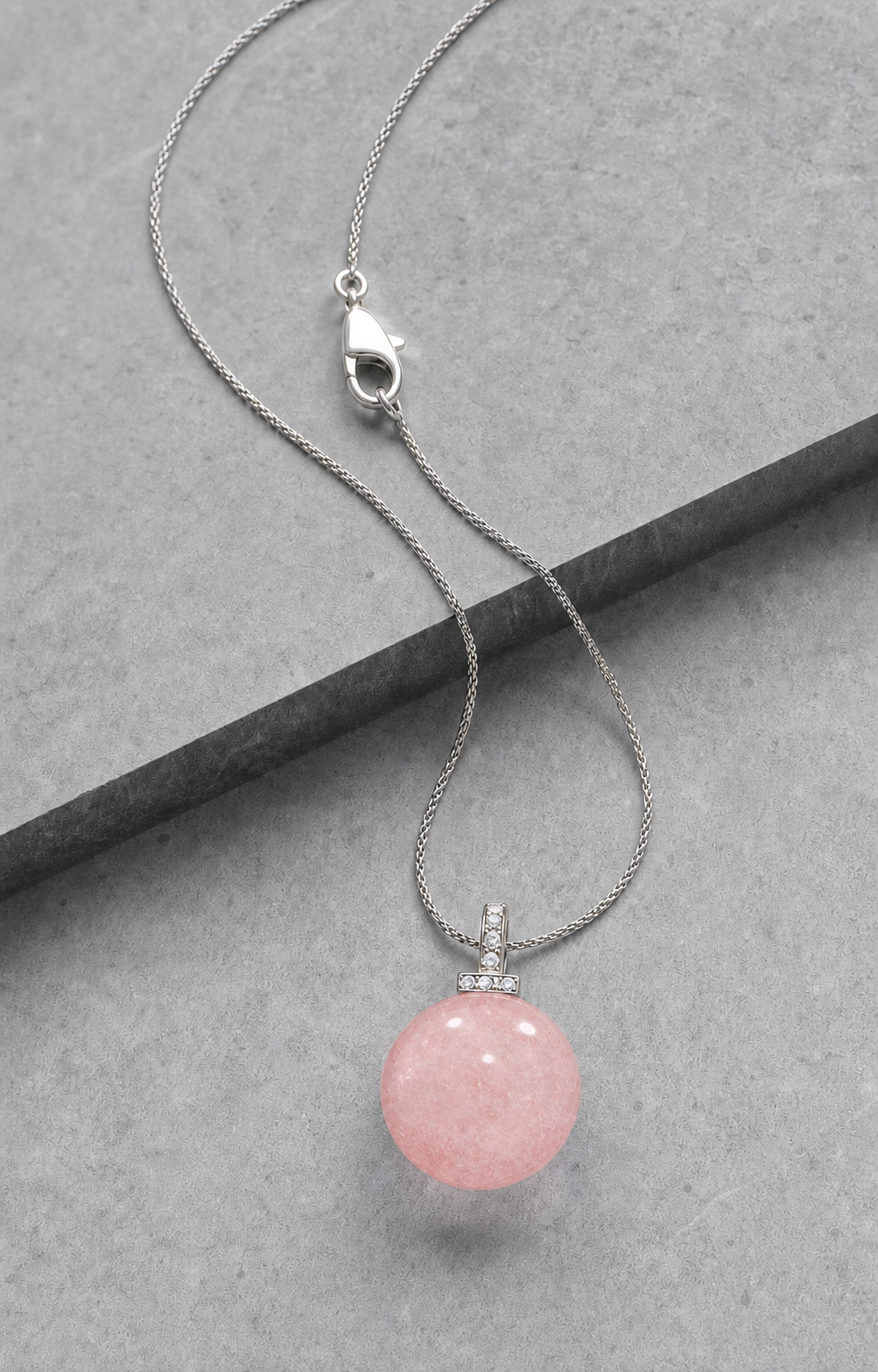Rose Quartz interchangeable pendant necklace, crystal still-life detail