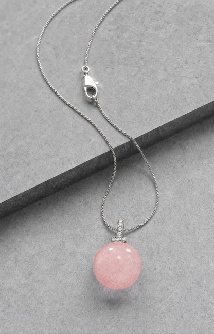 Rose Quartz interchangeable pendant necklace, crystal still-life detail