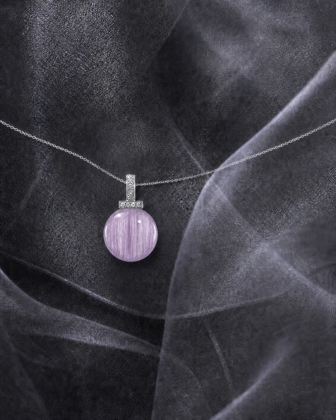 Kunzite interchangeable pendant necklace, crystal still-life detail