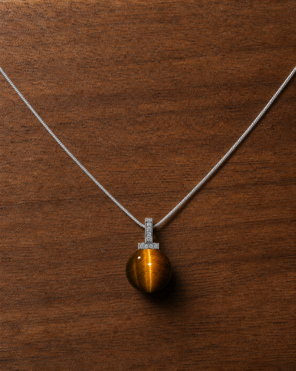 Yellow Tiger’s Eye interchangeable pendant necklace, crystal still-life detail