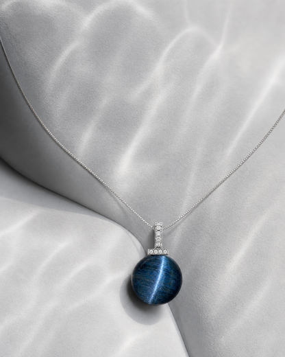 Blue Tiger’s Eye interchangeable pendant necklace, crystal still-life detail