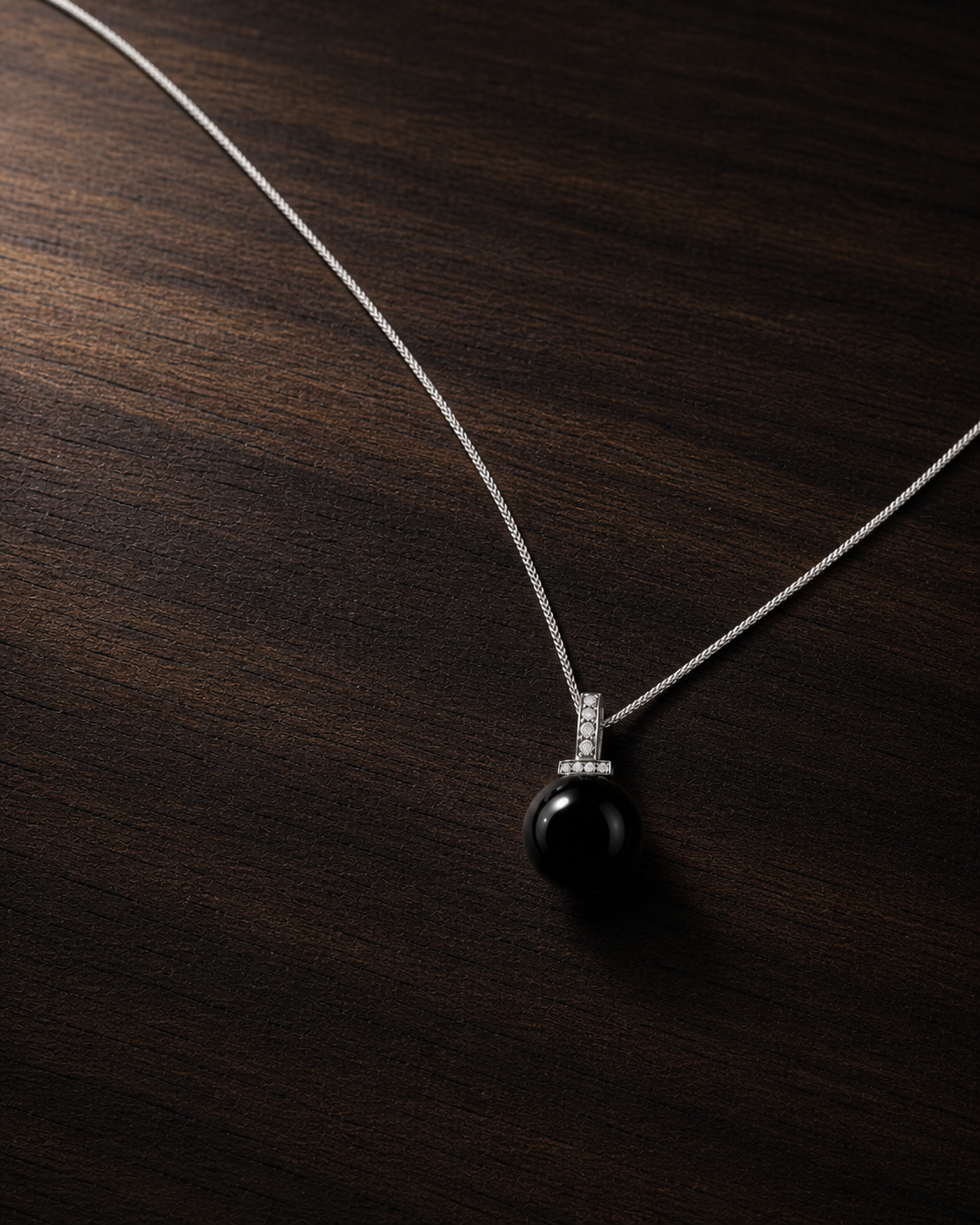 Black Obsidian interchangeable pendant necklace, crystal still-life detail