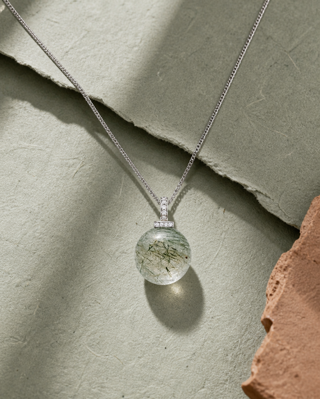 Green Rabbit Hair Quartz interchangeable pendant necklace, crystal still-life detail