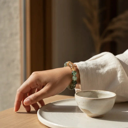 Dynamic Empire Builder Wealth stack bracelet, featuring golden and earthy tones for financial abundance.